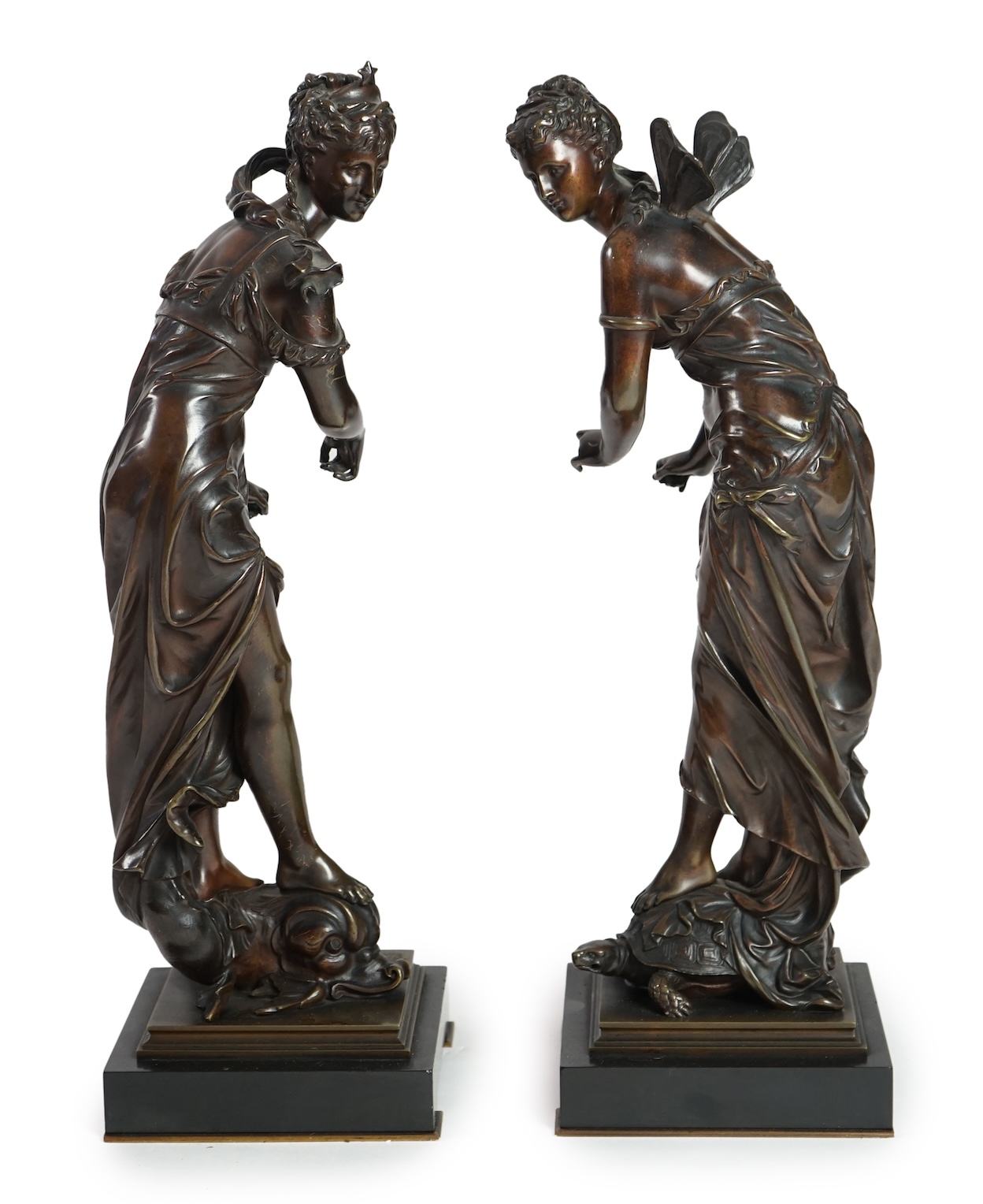 Eutrope Bouret, (French 1833-1906). A pair of late 19th century patinated bronze figures of Venus riding a dolphin and a nymph riding a tortoise